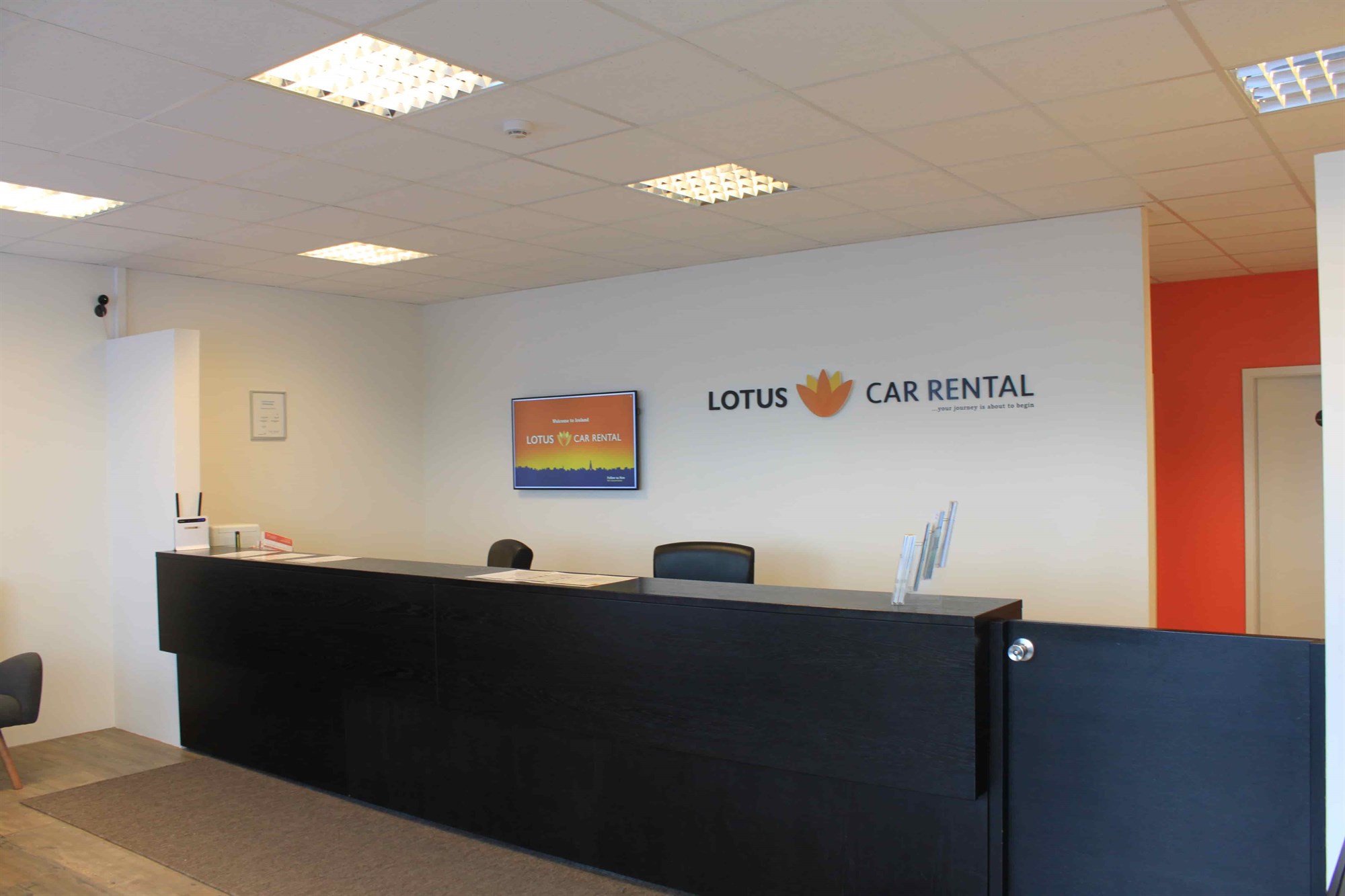 lotus car rental office reception desk