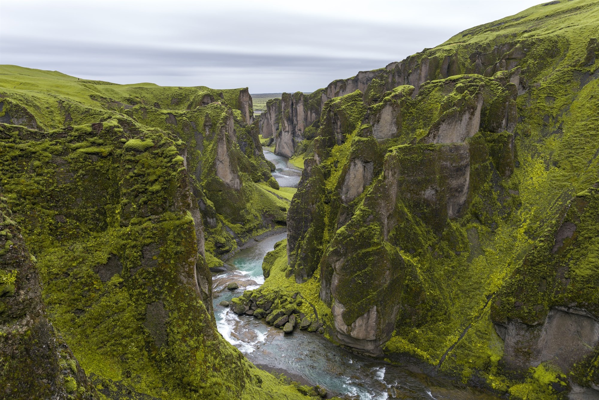 River running through Fjaðrárgljúfur Canyon