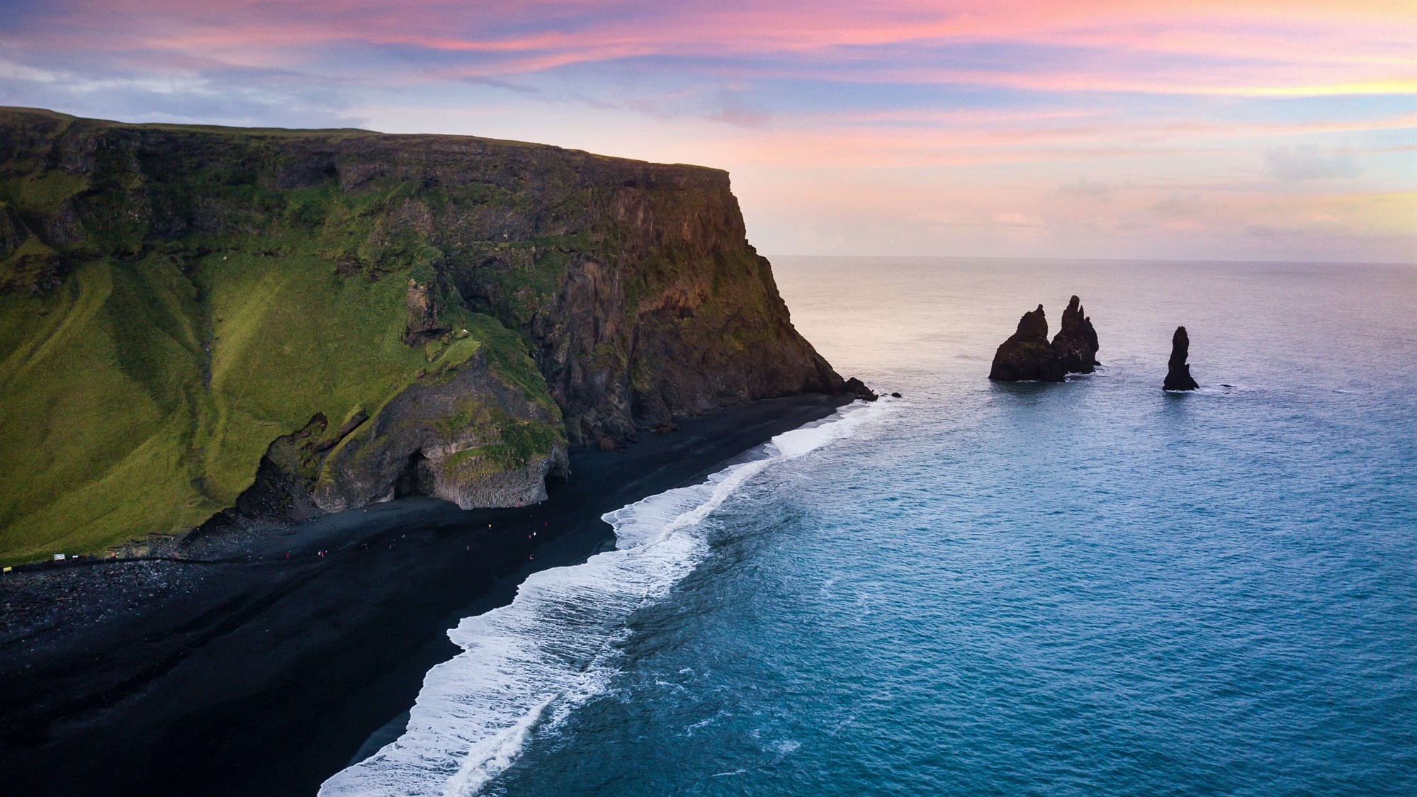 aerial shot of sunset over Reynisfjara black beach