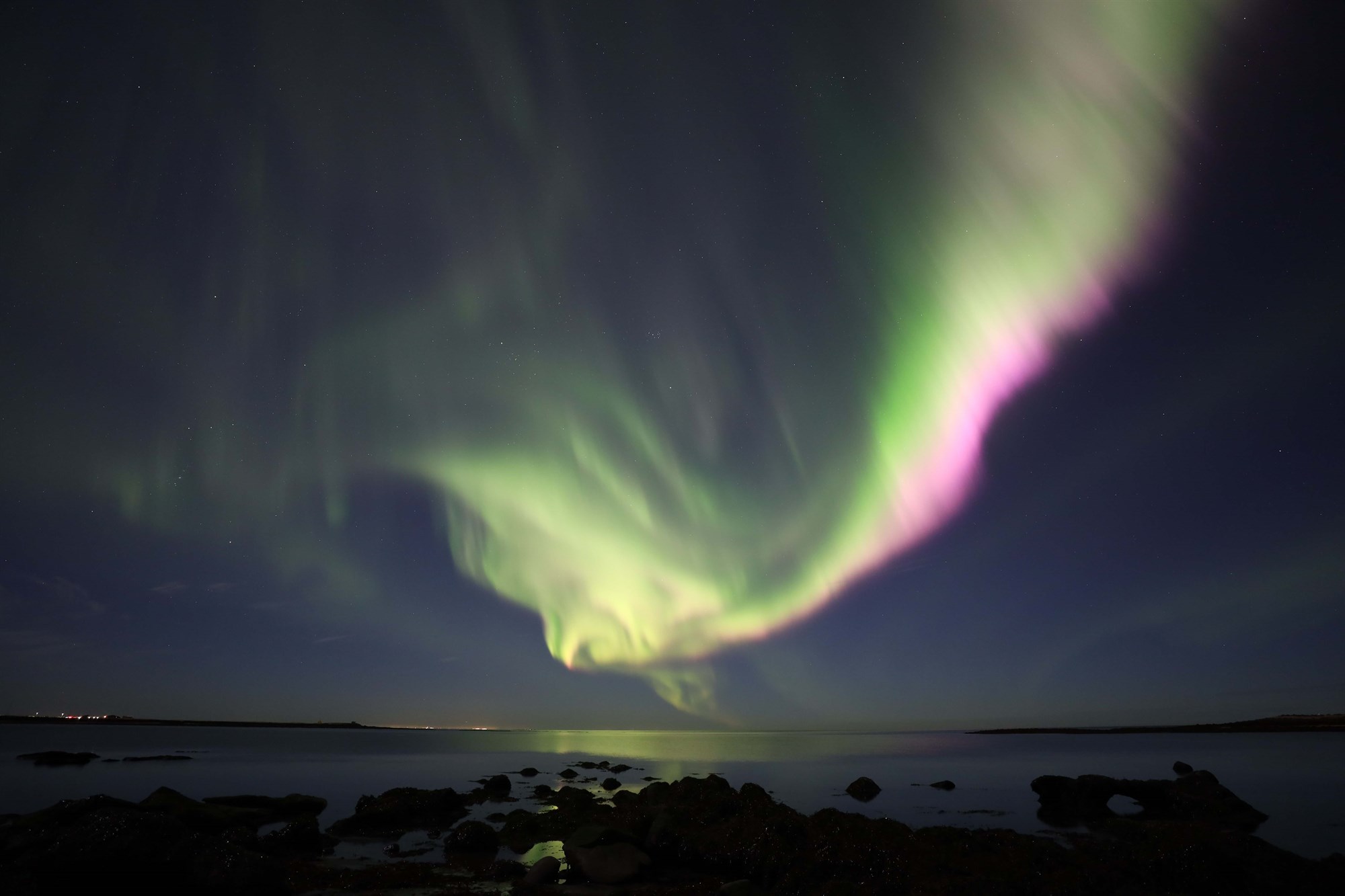 The northern lights from Seltjörn black beach